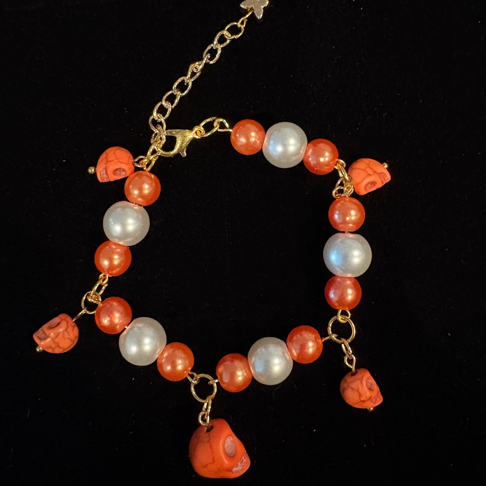 Gold and Orange Skull Charm Bracelet